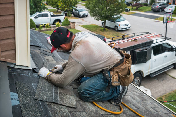 Professional Roofing technician working in Russellville, IN